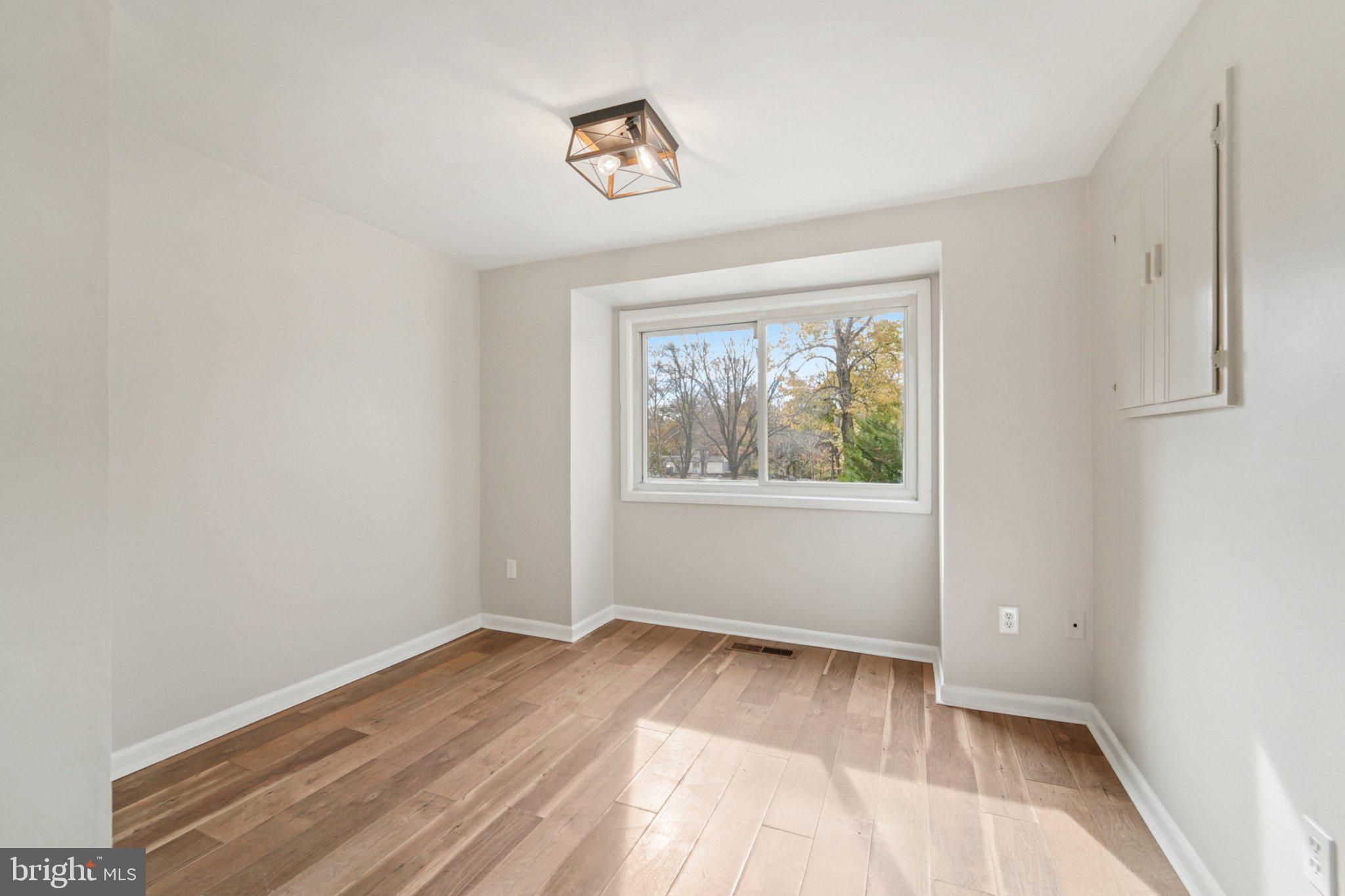 9432 Merryrest Road, Unit AB Columbia, MD 21045 - Photo 29 of 37 a view of an empty room with a window