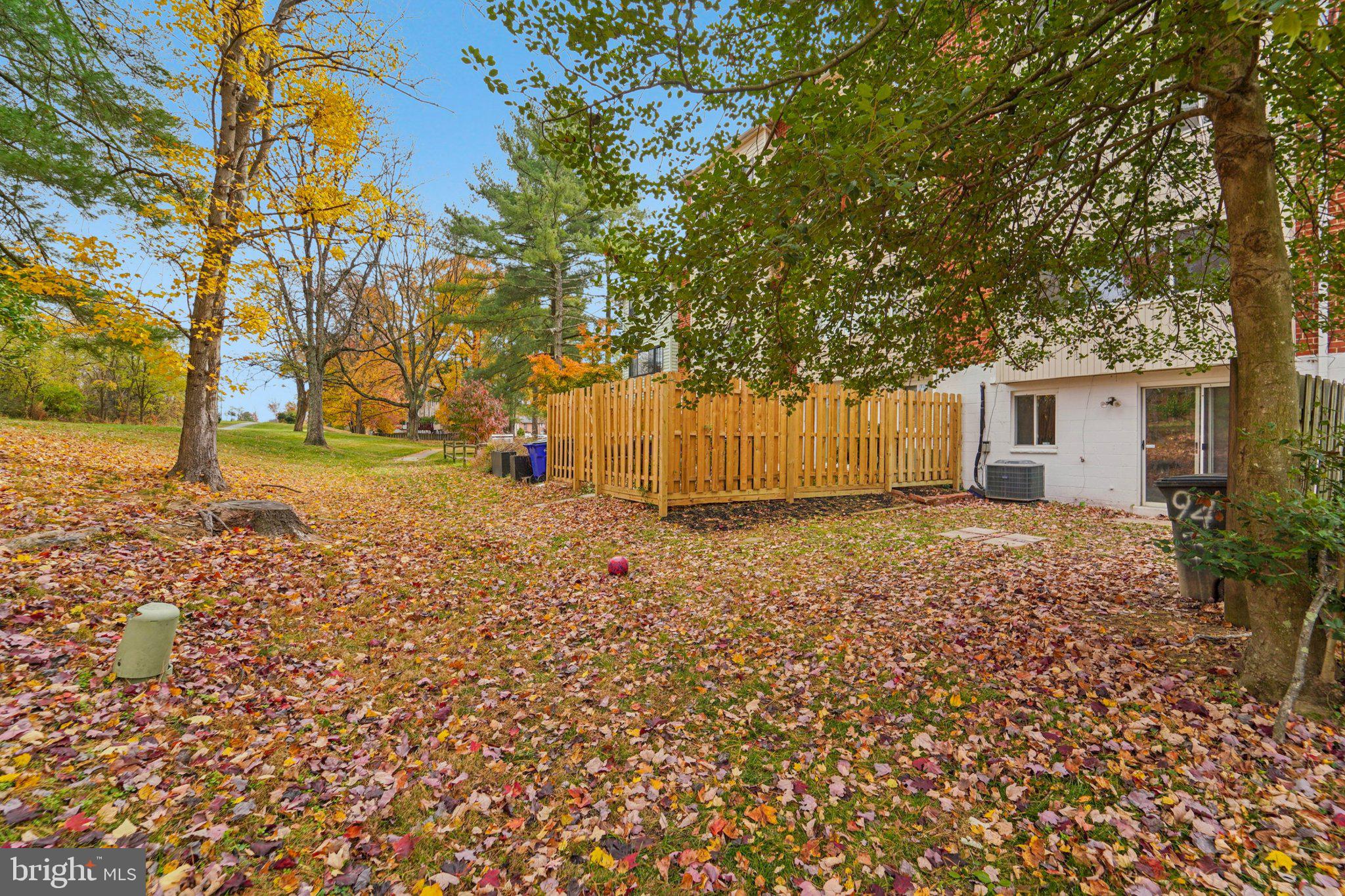9432 Merryrest Road, Unit AB Columbia, MD 21045 - Photo 37 of 37 a view of a backyard with large trees