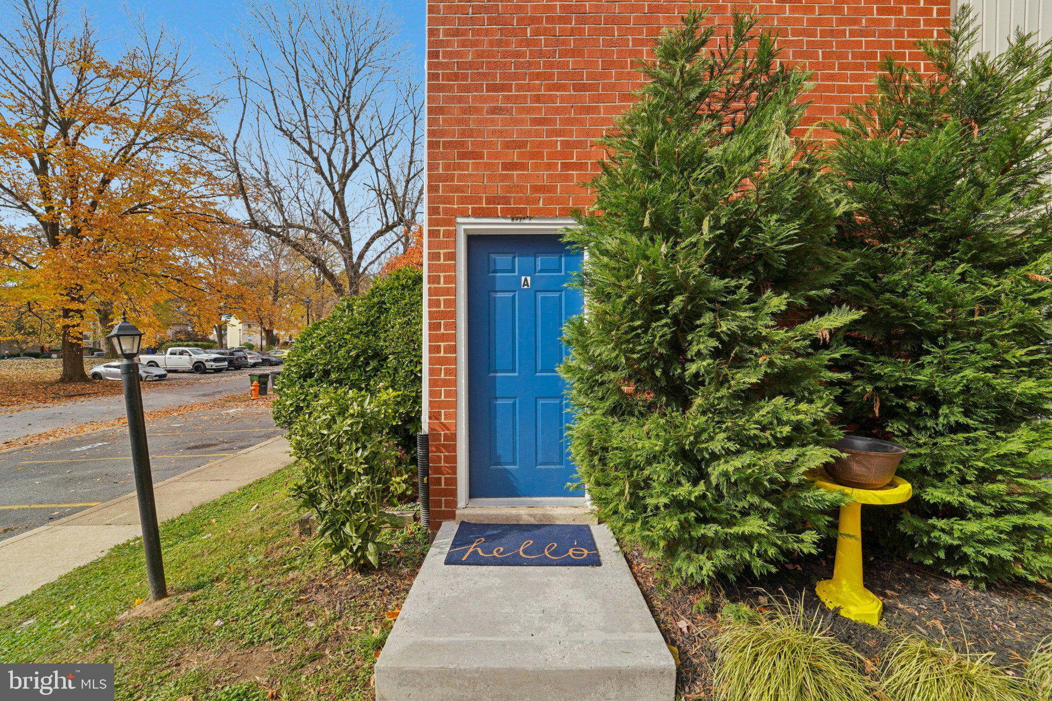 9432 Merryrest Road, Unit AB Columbia, MD 21045 - Photo 5 of 37 a view of a pathway besides a house