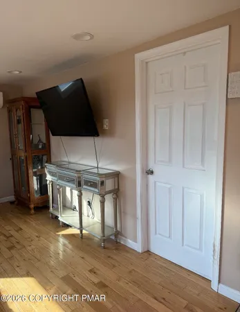 a living room with furniture and window