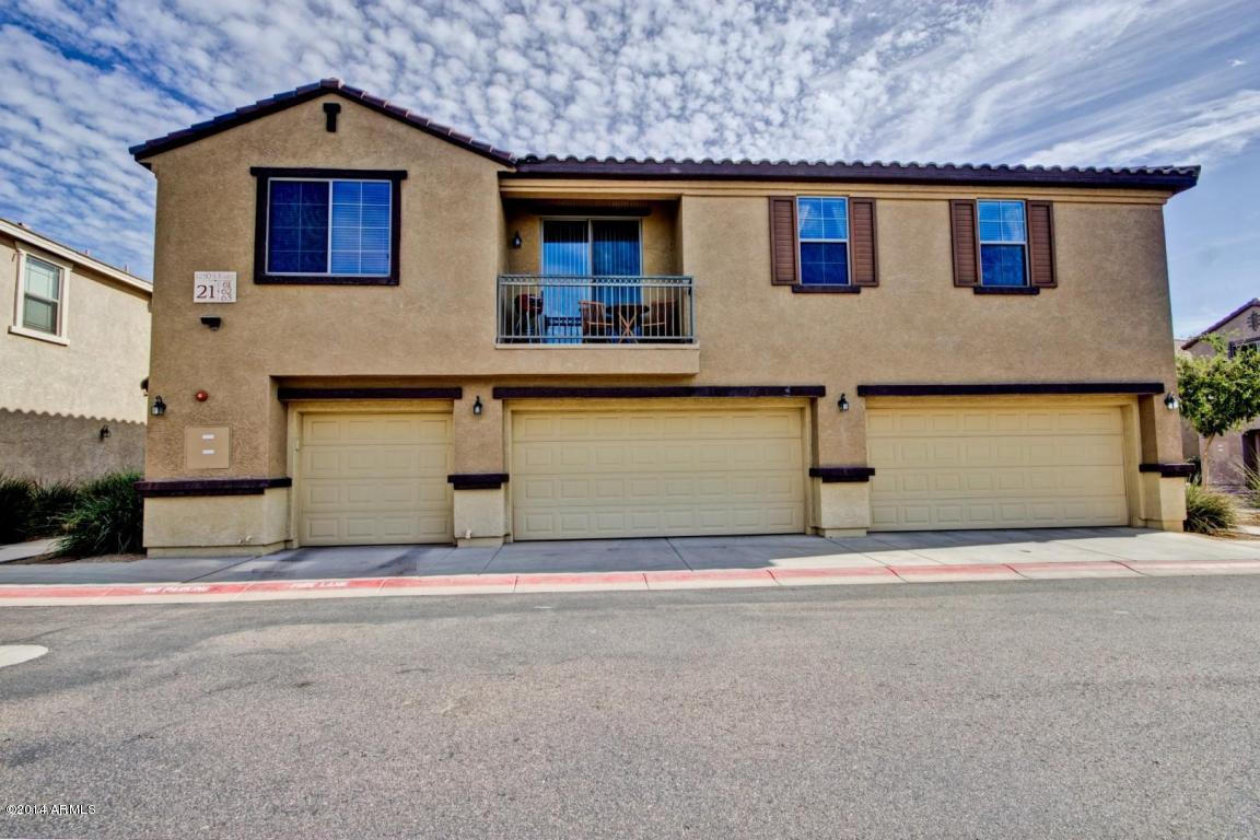 1250 South Rialto, Unit 62 Mesa, AZ 85209 - Photo 1 of 24 a front view of a house with a garage