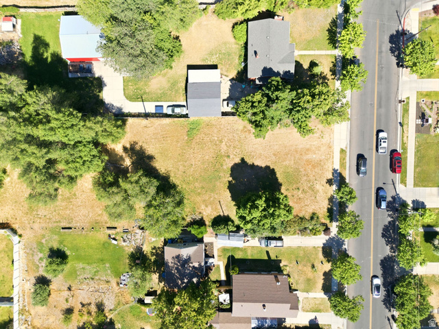 300 East S, Unit 2 Logan, UT 84321 - Photo 20 of 38 Expansive undeveloped land parcel with mature trees and street frontage