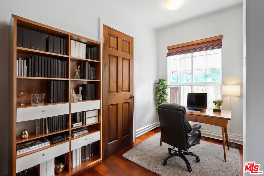 2477 Coolidge Avenue Los Angeles, CA 90064 - Photo 6 of 30 a view of a workspace with furniture and a window
