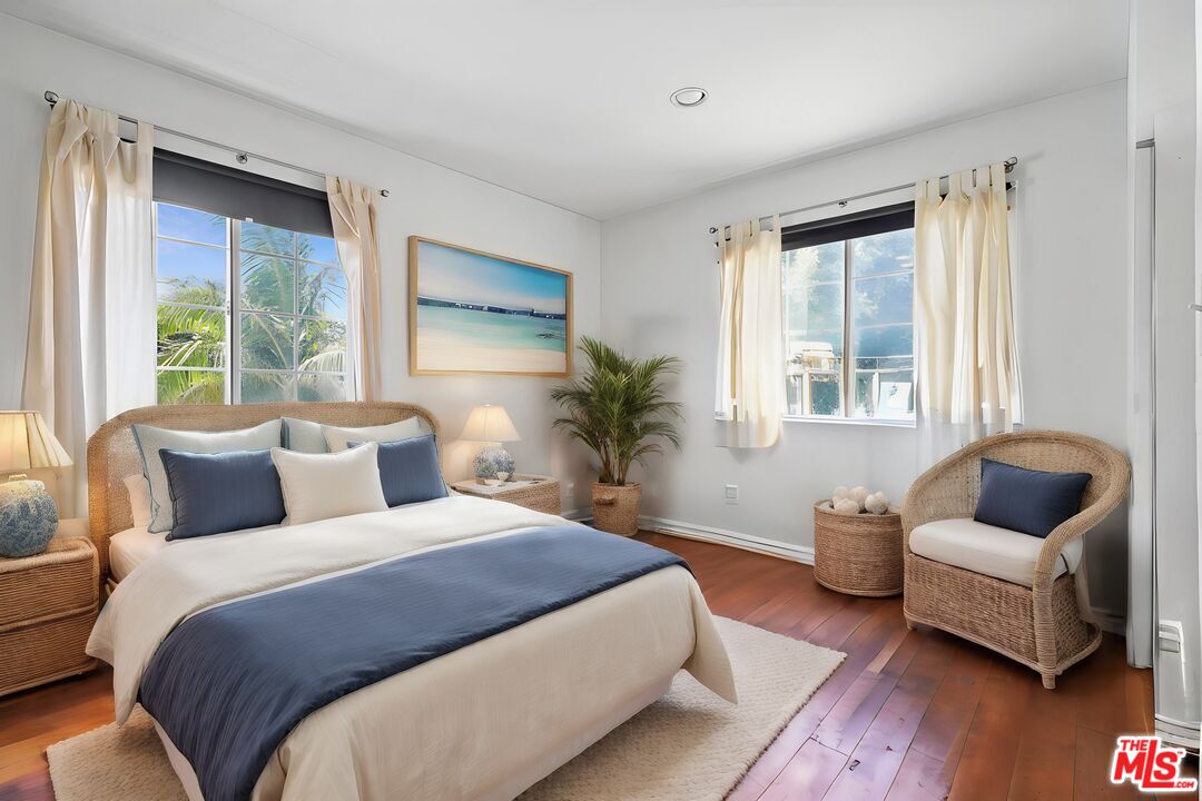 2477 Coolidge Avenue Los Angeles, CA 90064 - Photo 9 of 30 a bedroom with bed couch and window