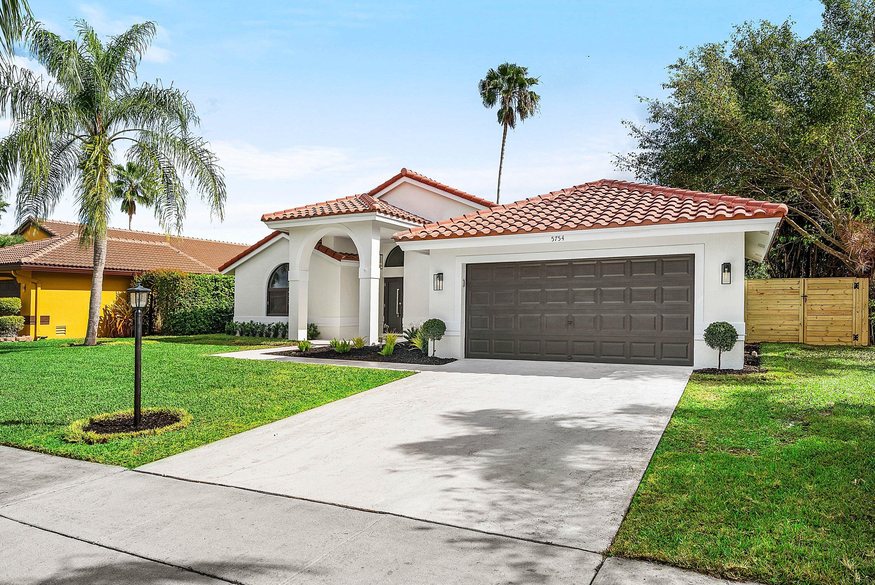 5754 Aspen Ridge Circle Delray Beach, FL 33484 - Photo 2 of 52 002-5754AspenRidgeCircle-DelrayBeach-FL-