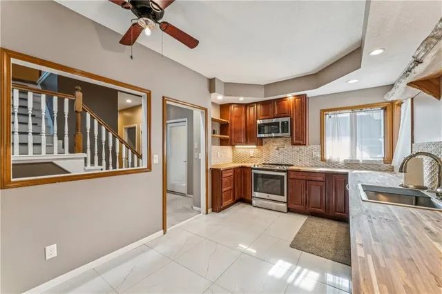 $400,000 | 336 Southwest Raintree Drive, Lee's Summit, MO 64082