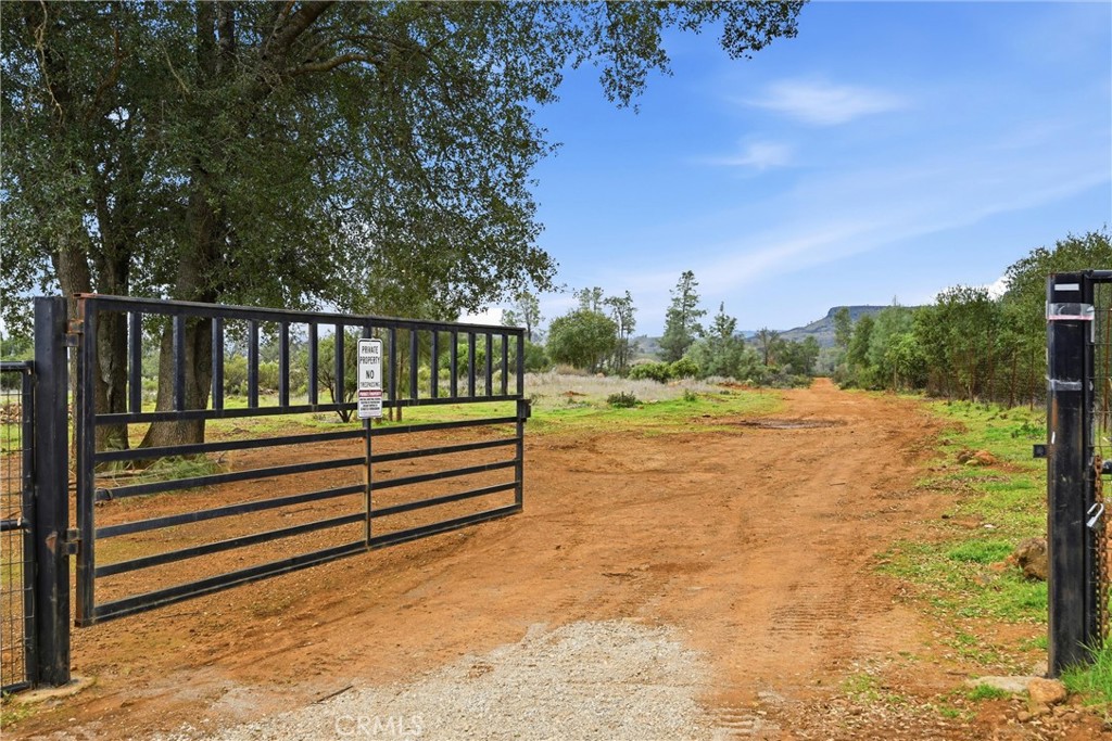 a view of outdoor space with deck and yard