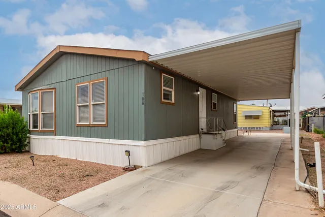 a front view of a house with a garage