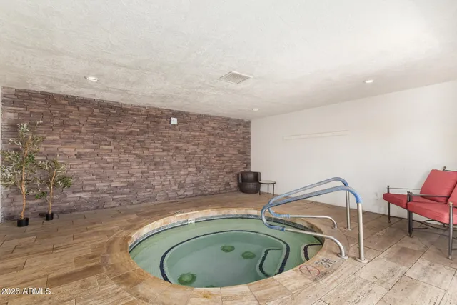 a bathroom with a sink mirror vanity and toilet