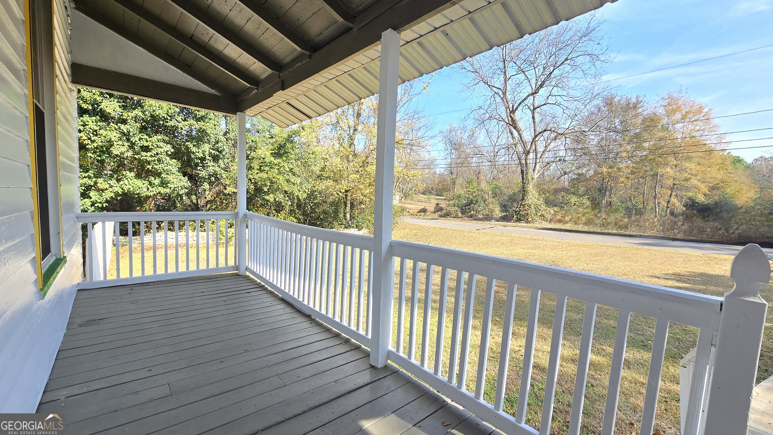 509 Anderson Avenue Fort Valley, GA 31030 - Photo 3 of 22 a view of a wooden deck next to a yard