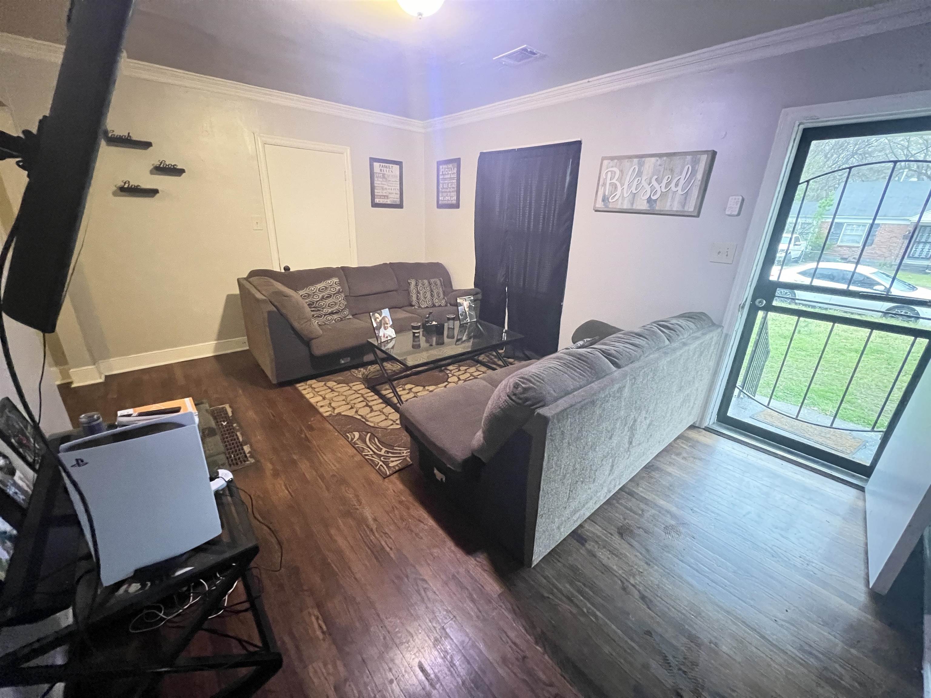 1007 Railton Road Memphis, TN 38111 - Photo 3 of 12 a living room with furniture and a window