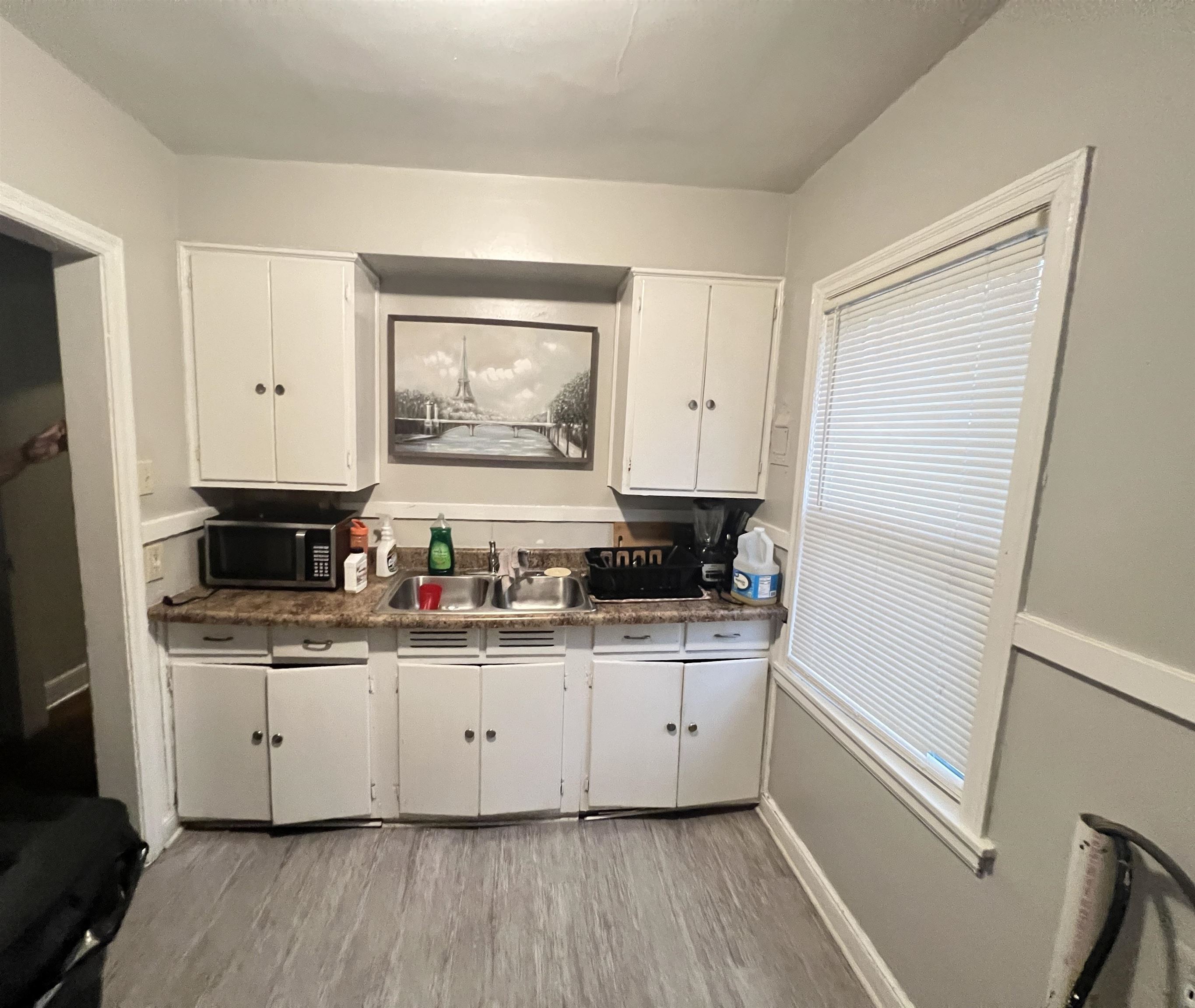 1007 Railton Road Memphis, TN 38111 - Photo 6 of 12 a kitchen with stainless steel appliances a sink a stove a refrigerator and cabinets