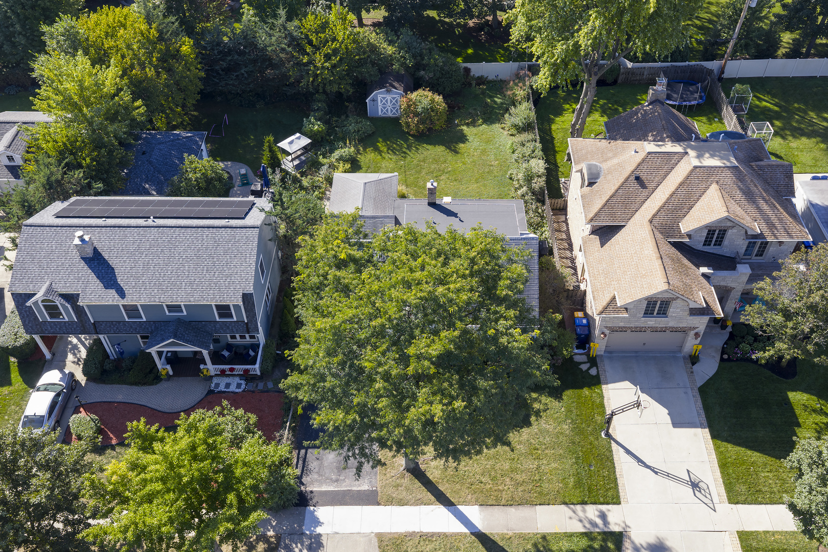 2221 Illinois Road Northbrook, IL 60062 - Photo 3 of 8 an aerial view of a house with garden space and street view