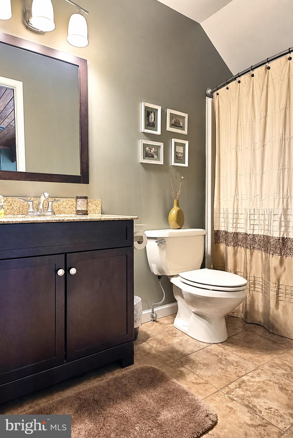 5632 Galestown - Reliance Road Rhodesdale, MD 21659 - Photo 27 of 30 a bathroom with a toilet a sink and mirror