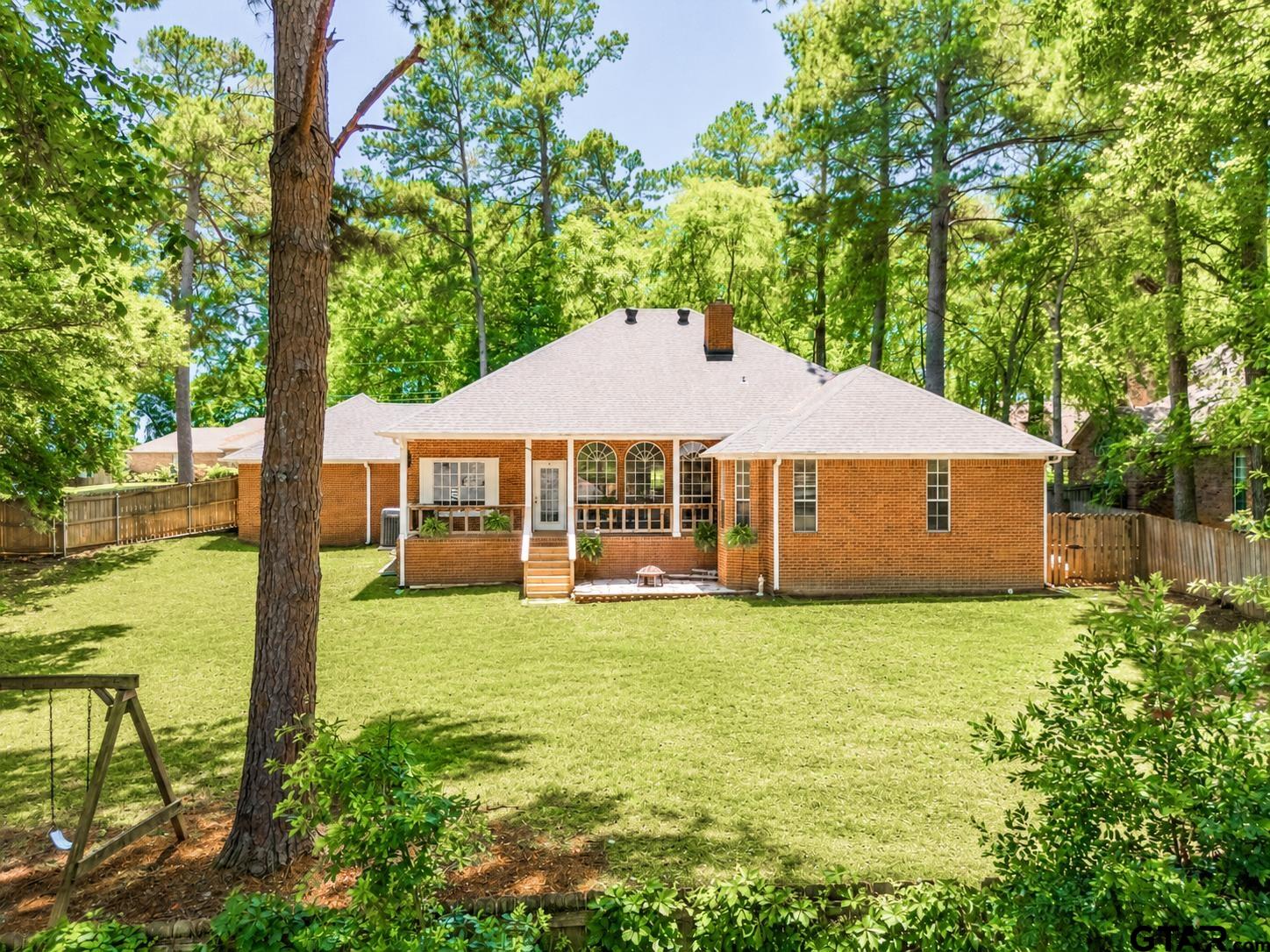 1388 Santa Fe Trail Tyler, TX 75703 - Photo 45 of 46 a front view of a house with garden