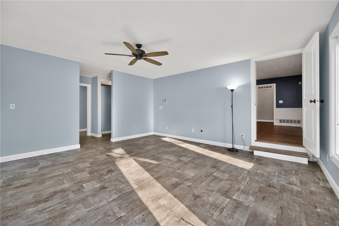 4747 Fawnwood Road Dayton, OH 45429 - Photo 28 of 58 Bright and airy living room with a neutral color palette, featuring durable plank flooring.