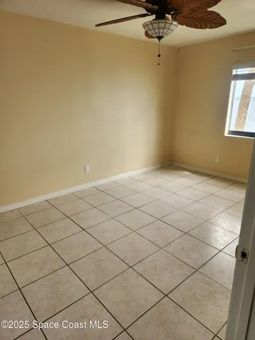 a view of a livingroom and window