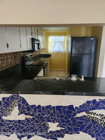 a living room with a couch and a coffee table