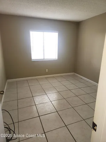 a view of a room with a window