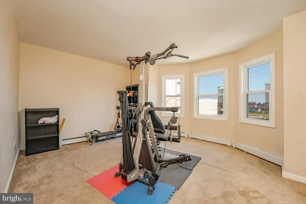 a view of a room with gym equipment