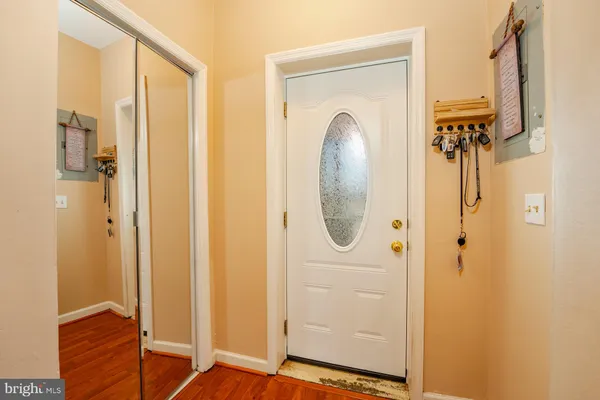 a view of front door with stairs
