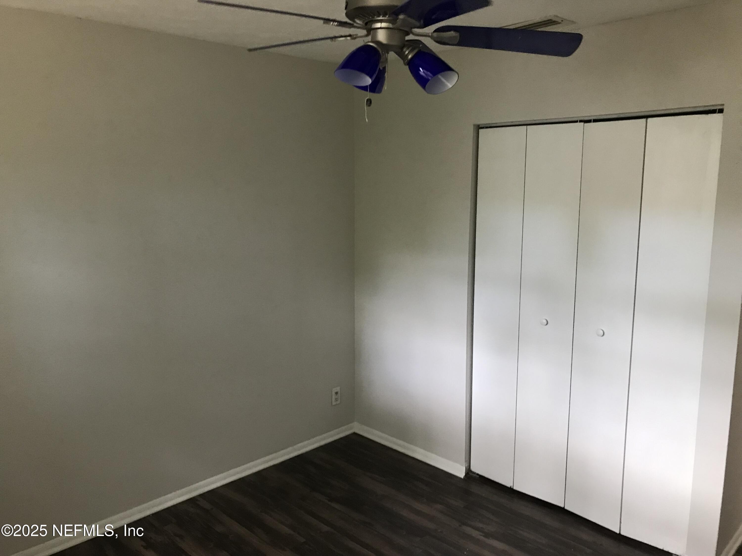 7419 Sandhurst Road South Jacksonville, FL 32277 - Photo 15 of 16 a view of a room with wooden floor