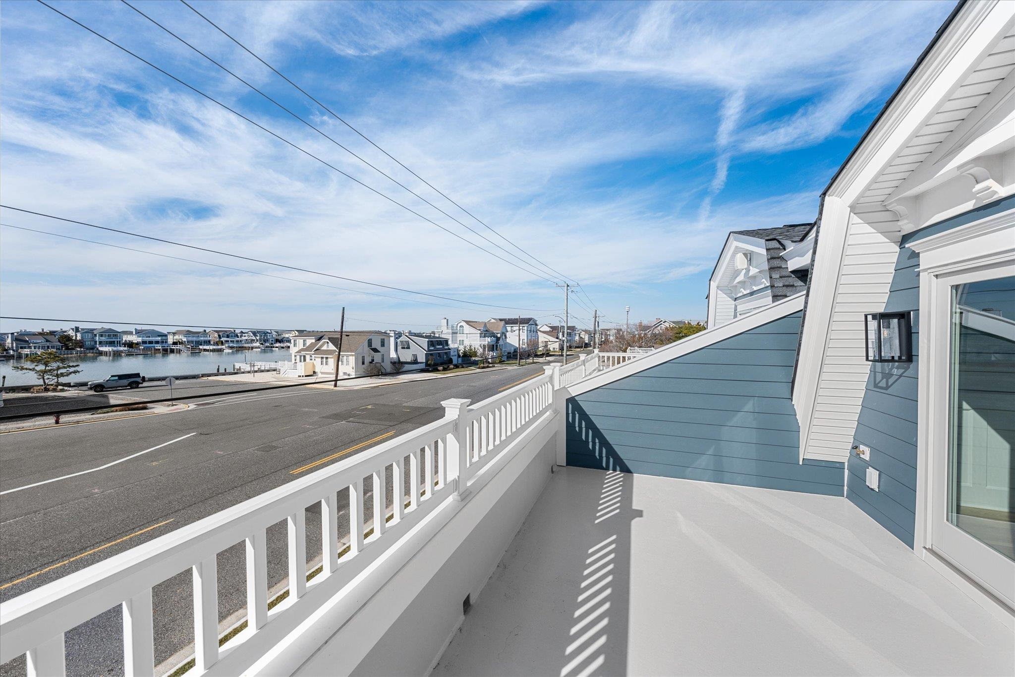10700 3rd, Unit SOUTH Stone Harbor, NJ 08247 - Photo 26 of 30 a view of a balcony with an outdoor space