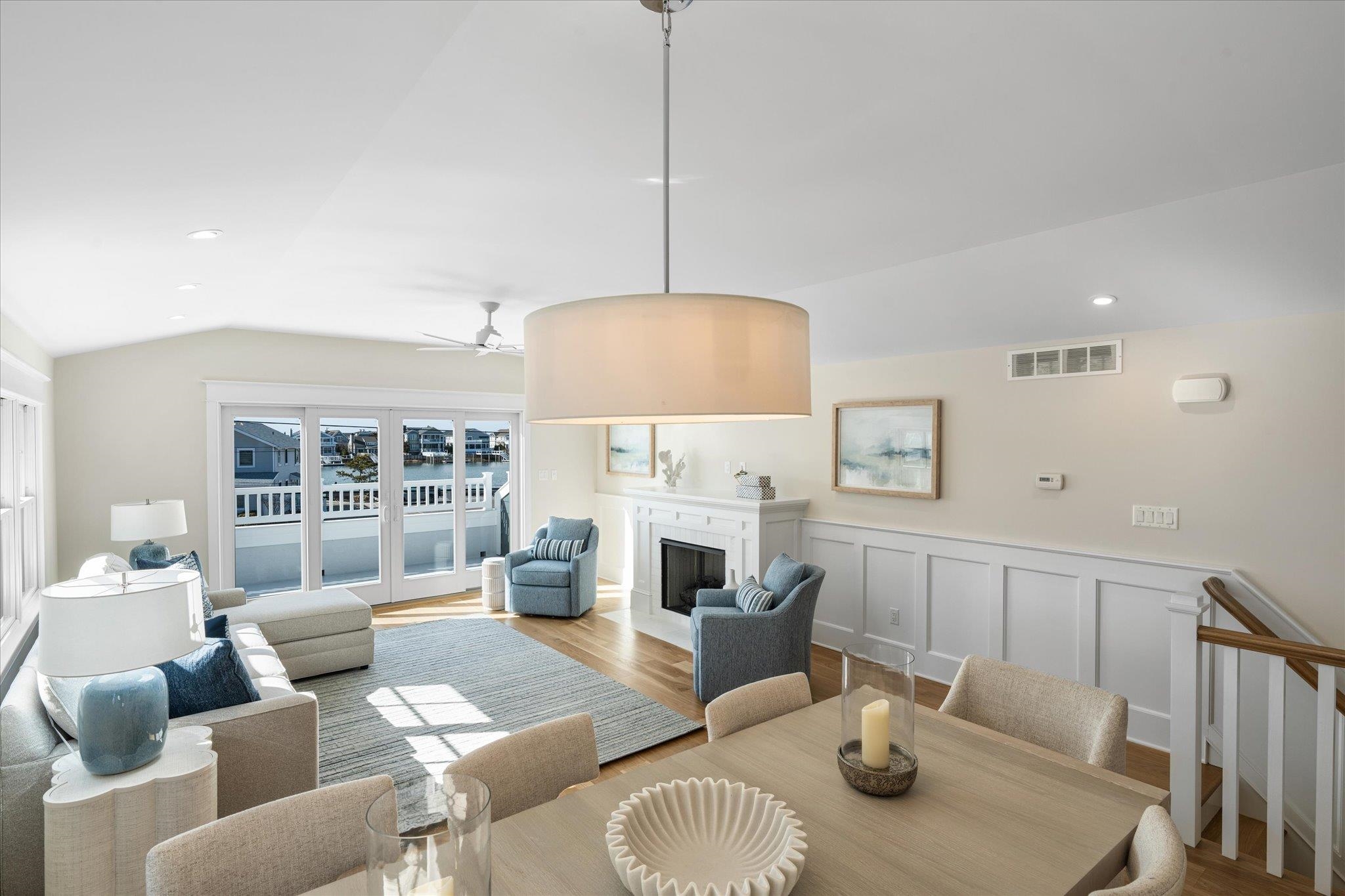 10700 3rd, Unit SOUTH Stone Harbor, NJ 08247 - Photo 5 of 30 a living room with furniture and a fireplace