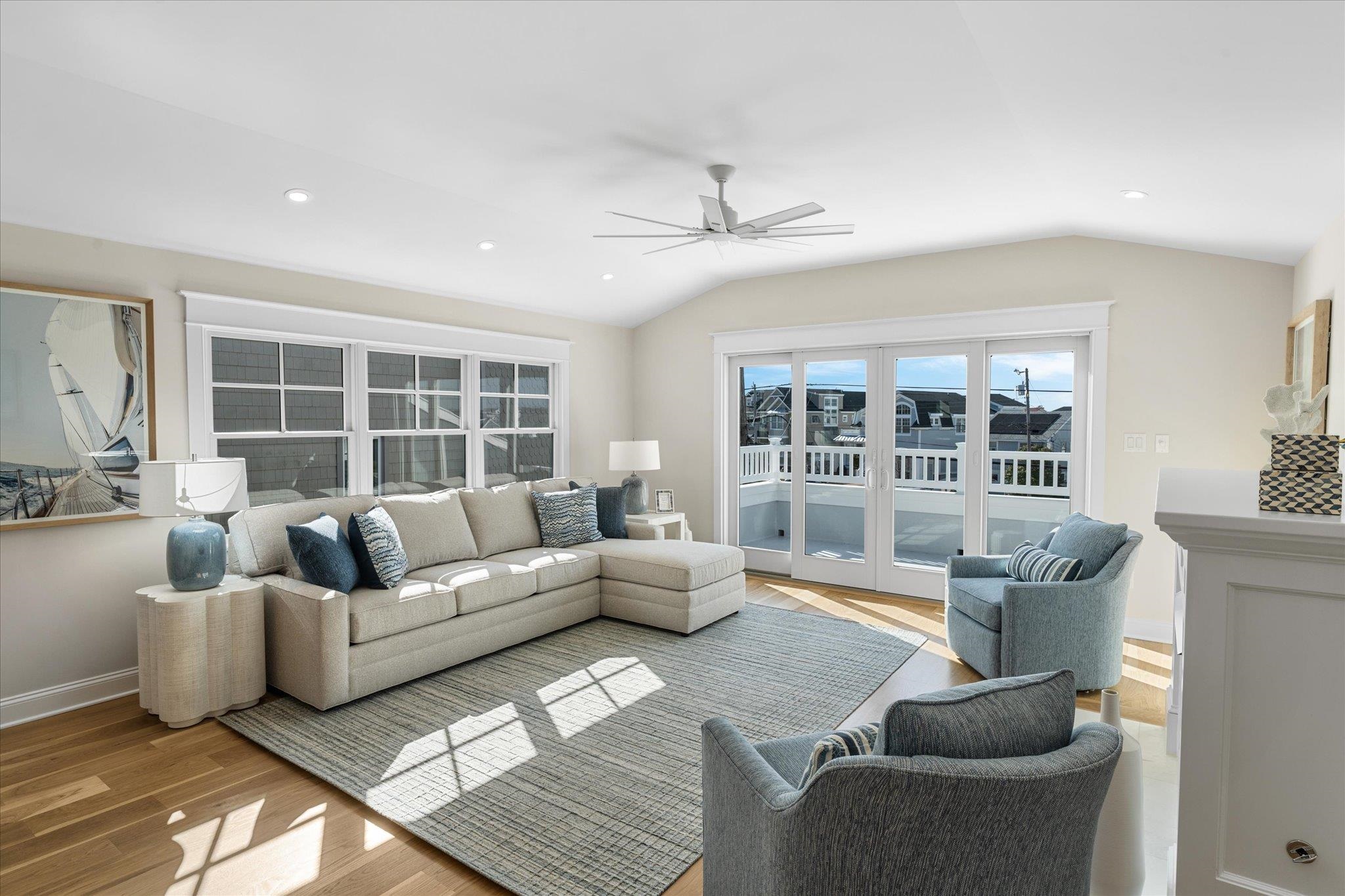 10700 3rd, Unit SOUTH Stone Harbor, NJ 08247 - Photo 7 of 30 a living room with furniture and a large window