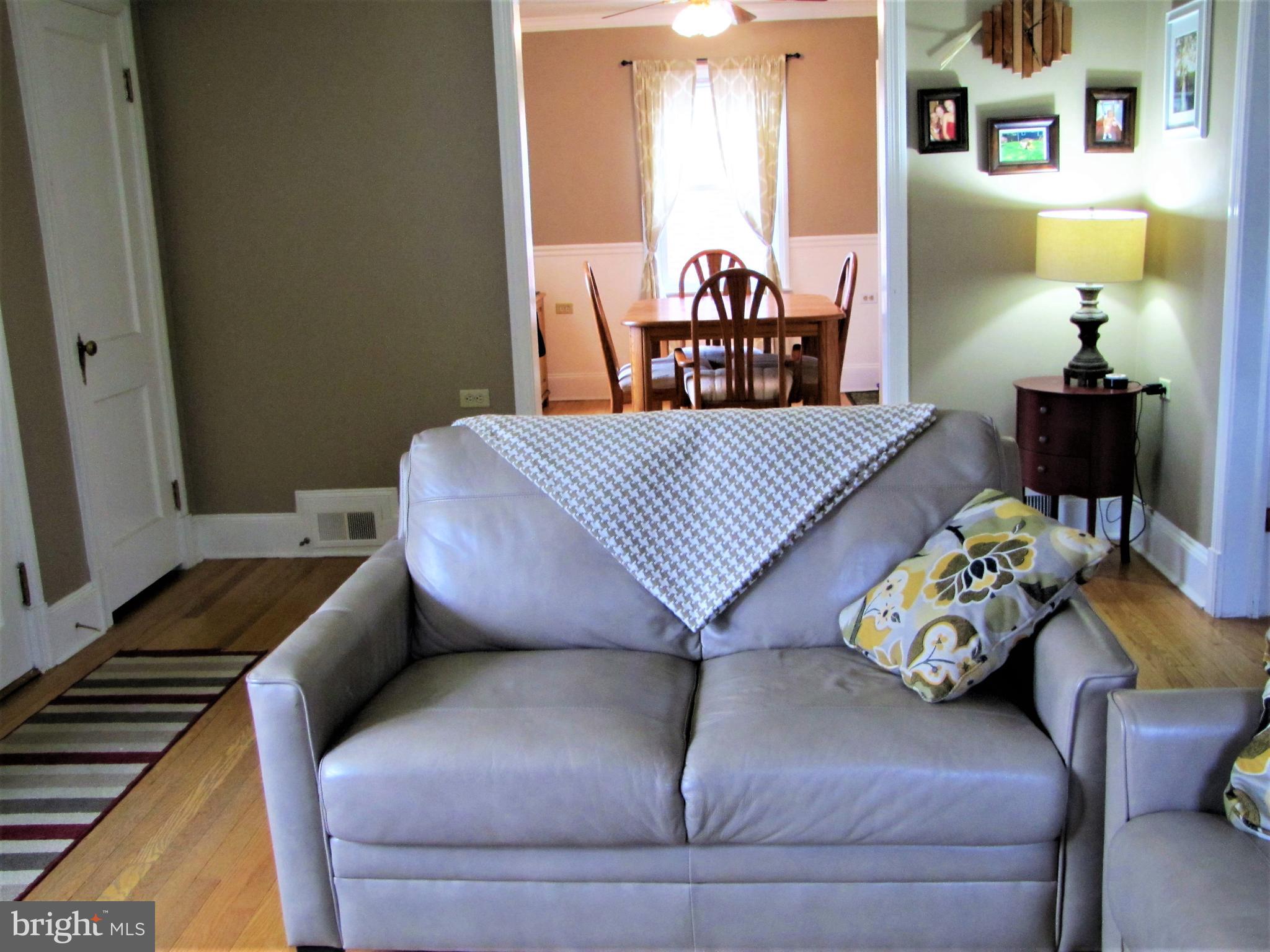 6310 South Orchard Road Linthicum, MD 21090 - Photo 15 of 52 Living room with view to dining room