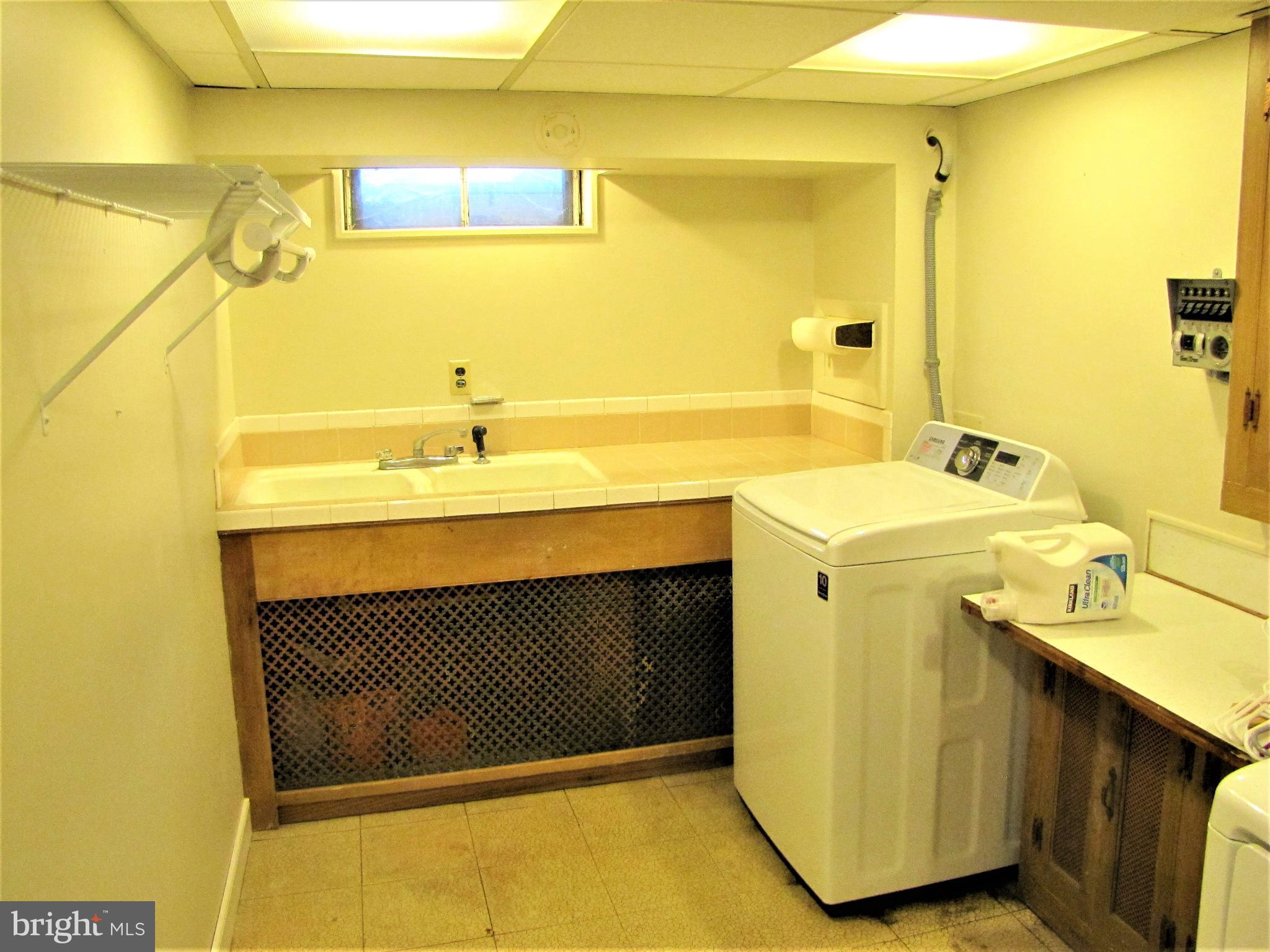 6310 South Orchard Road Linthicum, MD 21090 - Photo 43 of 52 Large laundry room