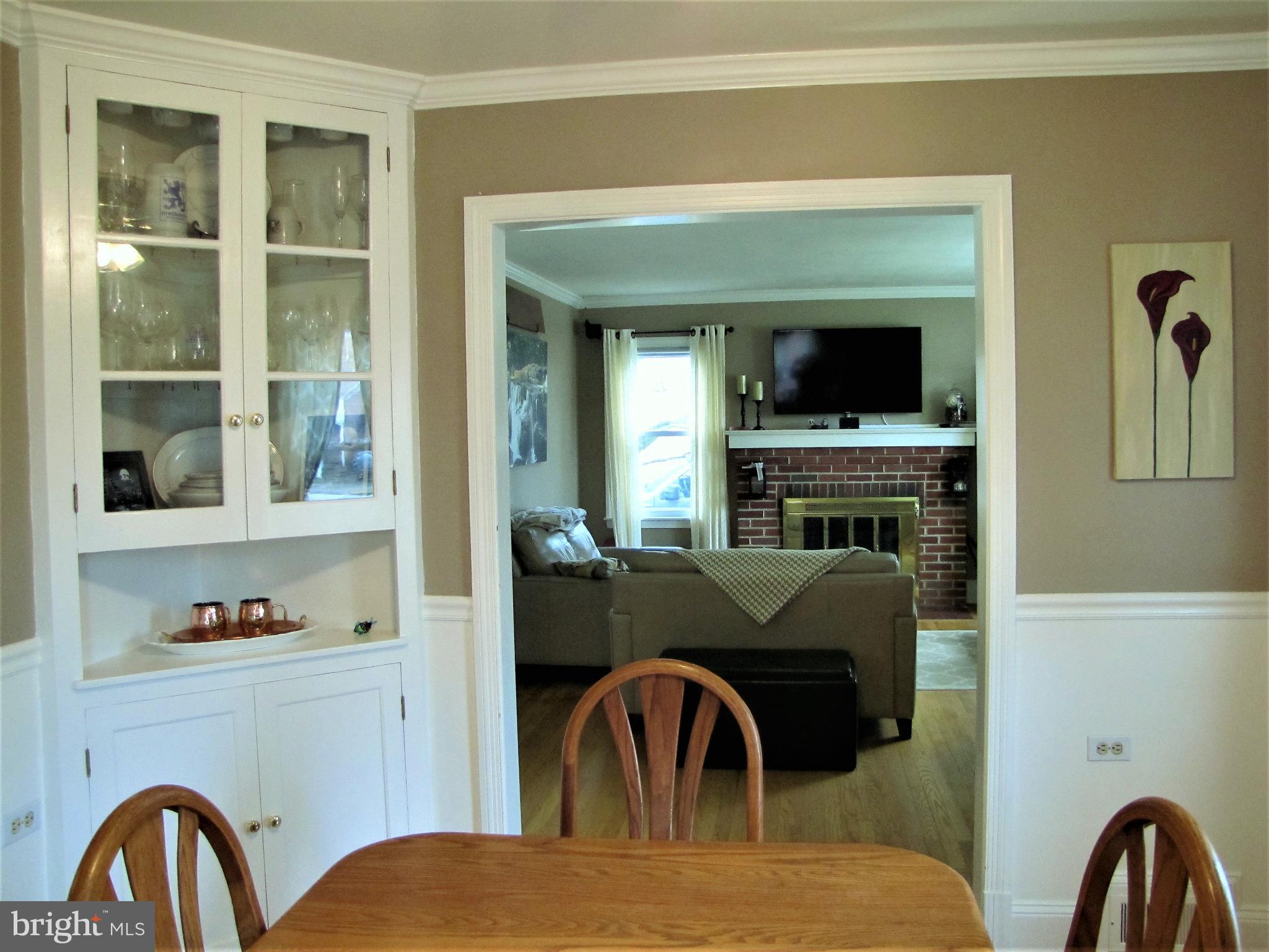6310 South Orchard Road Linthicum, MD 21090 - Photo 9 of 52 Dining room with charming corner cabinet