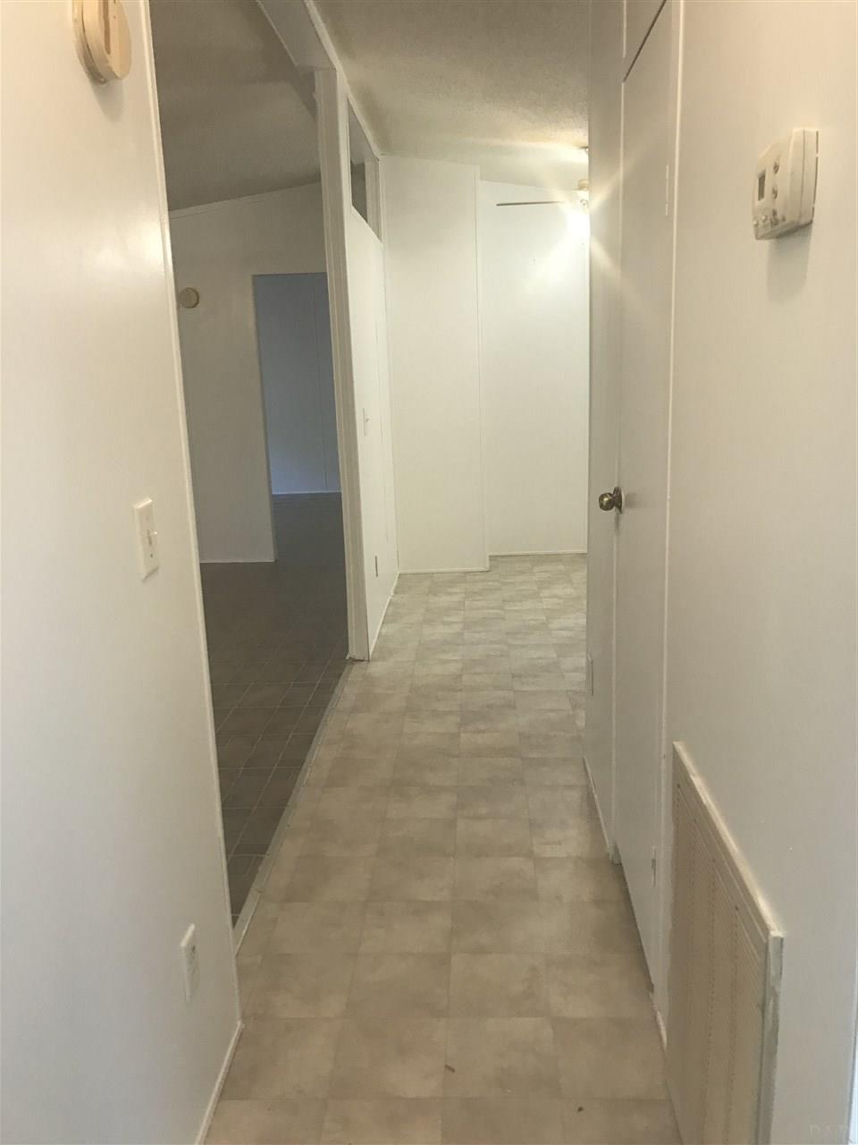 1176 Country Living Road Baker, FL 32531 - Photo 19 of 27 a view of a hallway