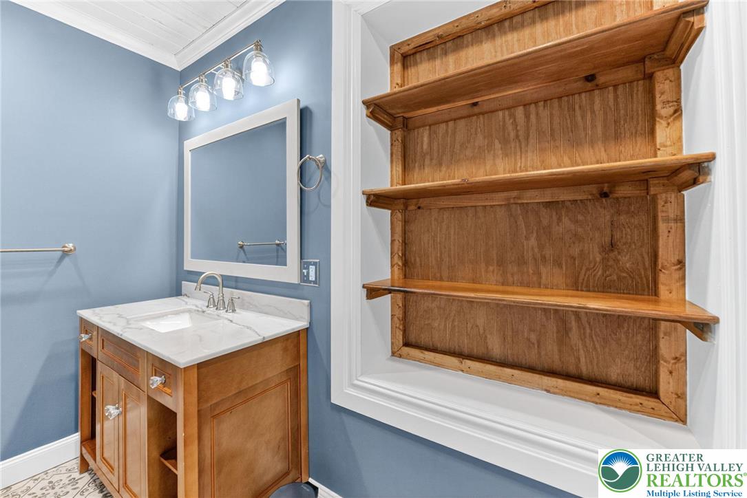 4430 Coplay Creek Road, Unit B Schnecksville, PA 18078 - Photo 14 of 27 a bathroom with a sink and a mirror