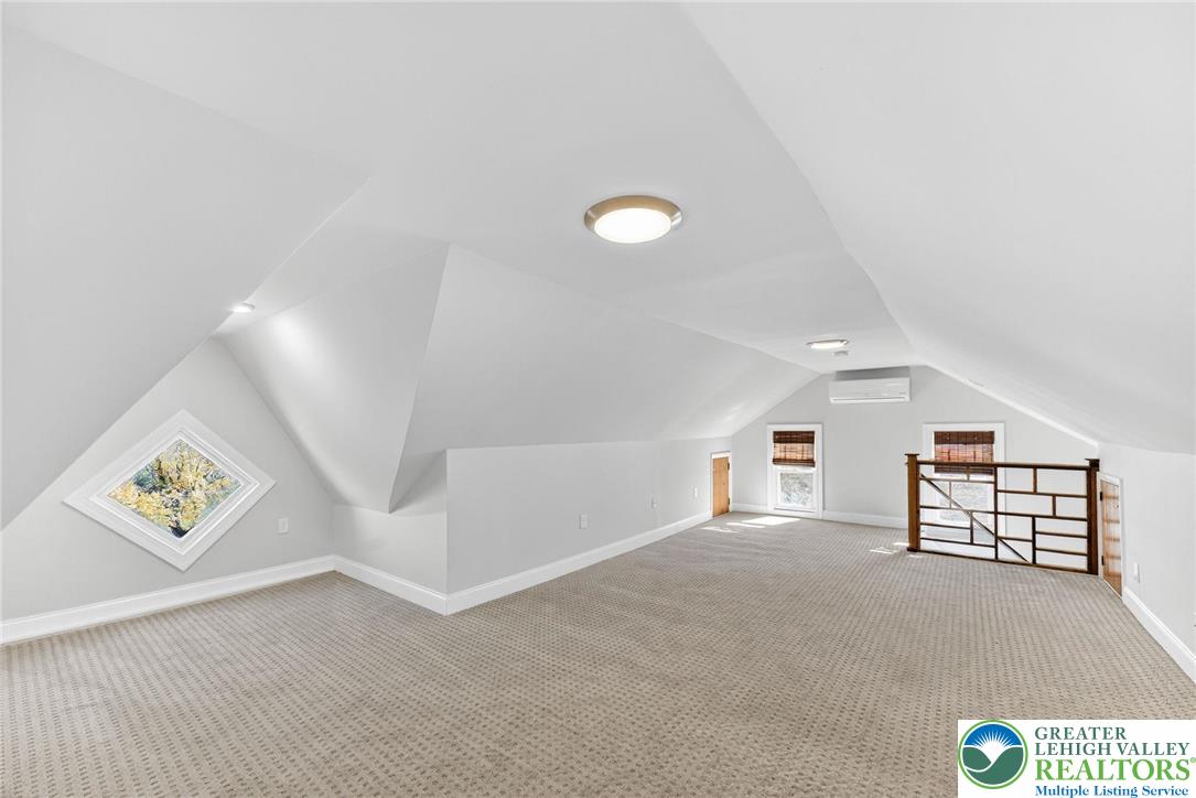 4430 Coplay Creek Road, Unit B Schnecksville, PA 18078 - Photo 17 of 27 wooden floor in an empty room with a window