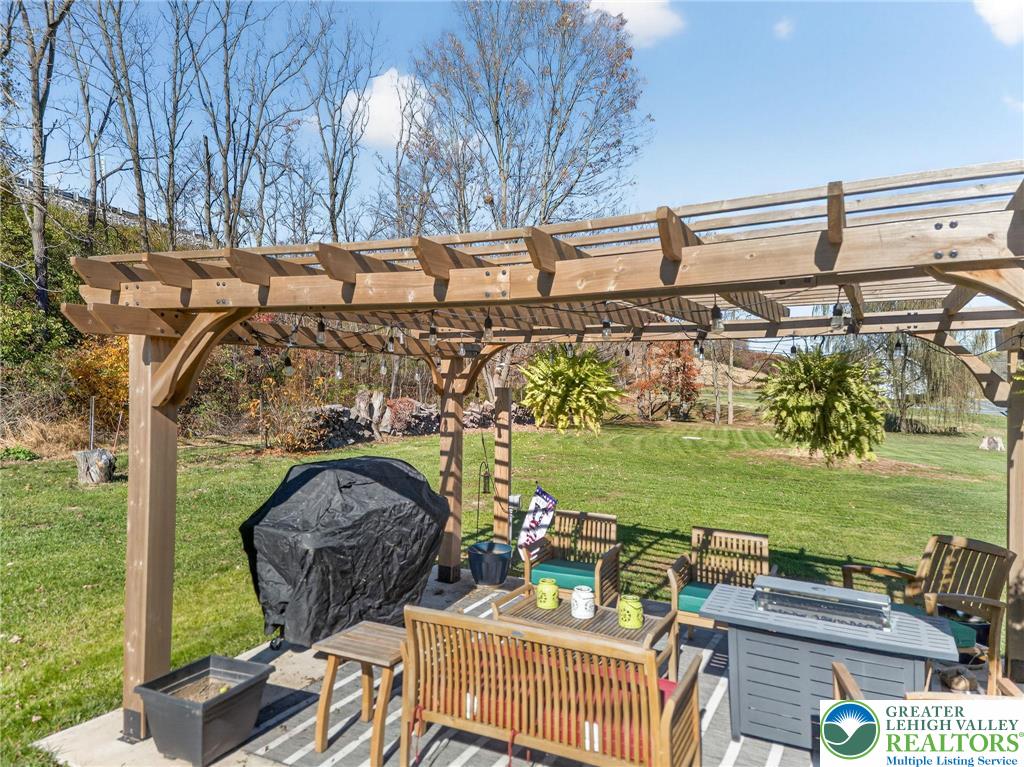 4430 Coplay Creek Road, Unit B Schnecksville, PA 18078 - Photo 20 of 27 a view of a chairs and table in the patio