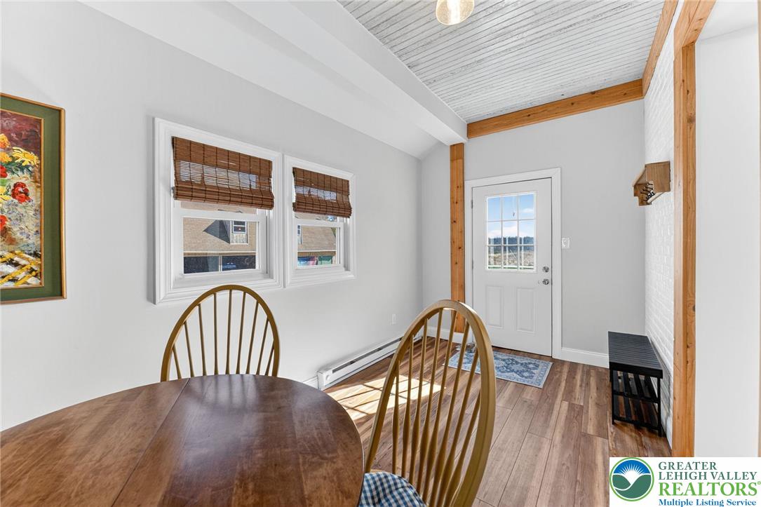 4430 Coplay Creek Road, Unit B Schnecksville, PA 18078 - Photo 9 of 27 a view of a dining room with furniture and wooden floor