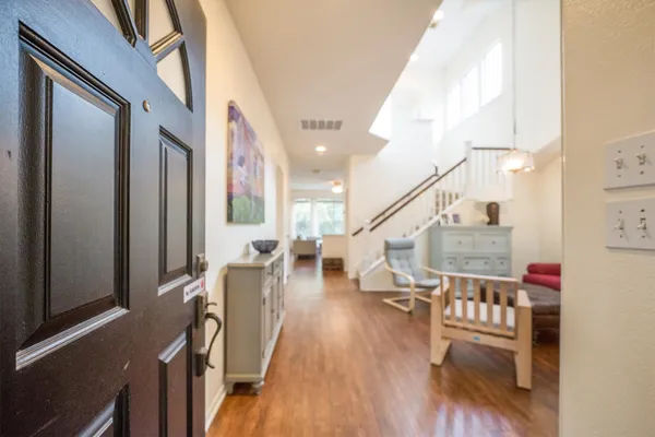 a view of an entryway and livingroom