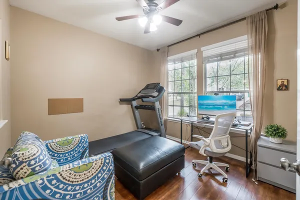 a living room with furniture and a window