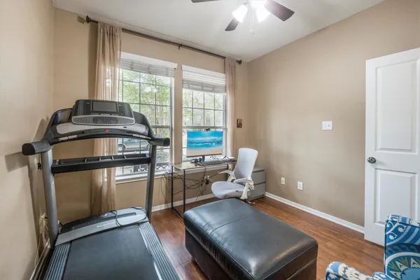 a living room with furniture fireplace and a flat screen tv