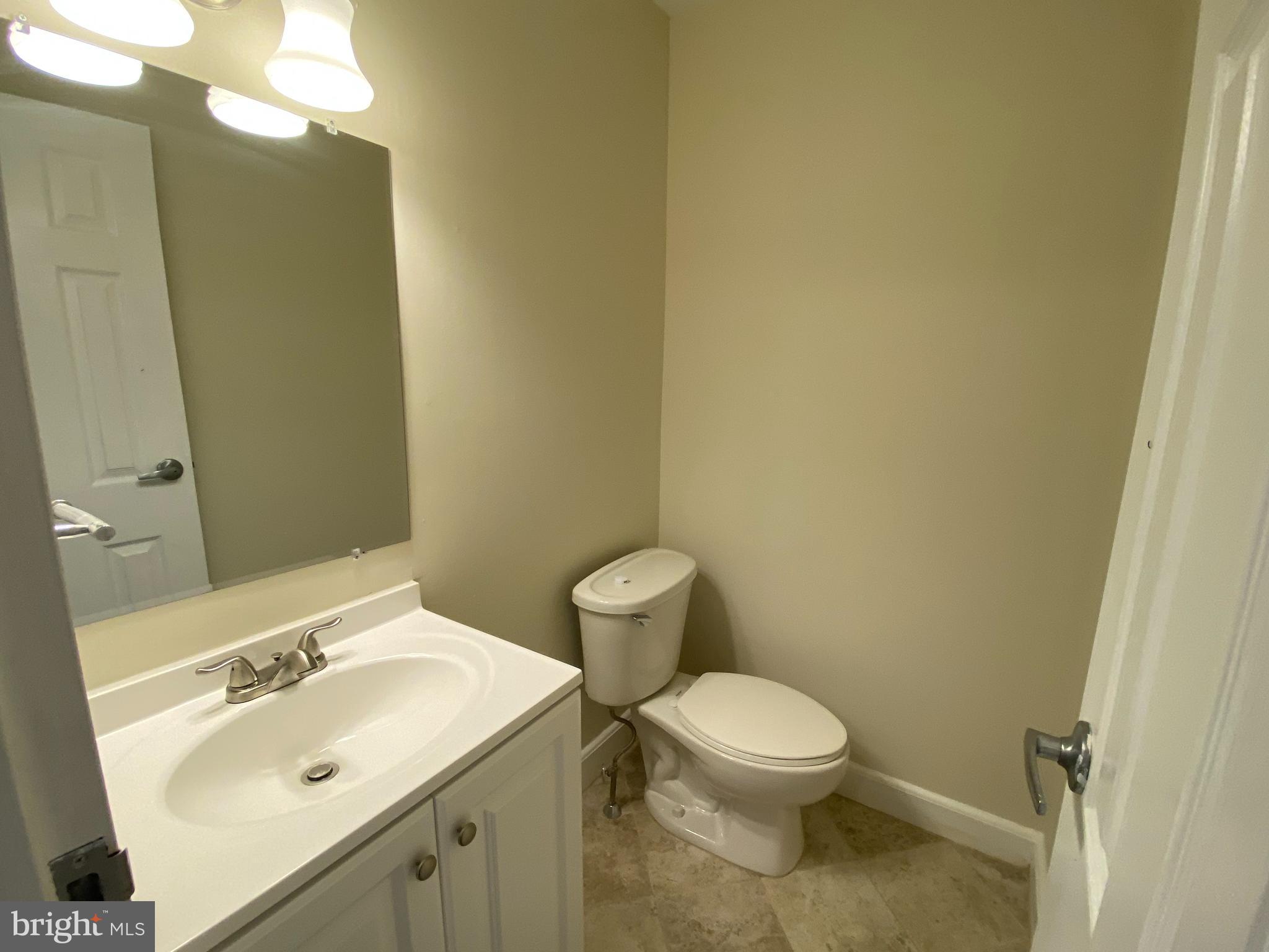 280 Bridgewater Road, Unit B18 Brookhaven, PA 19015 - Photo 19 of 23 Powder room-ceramic tile floor