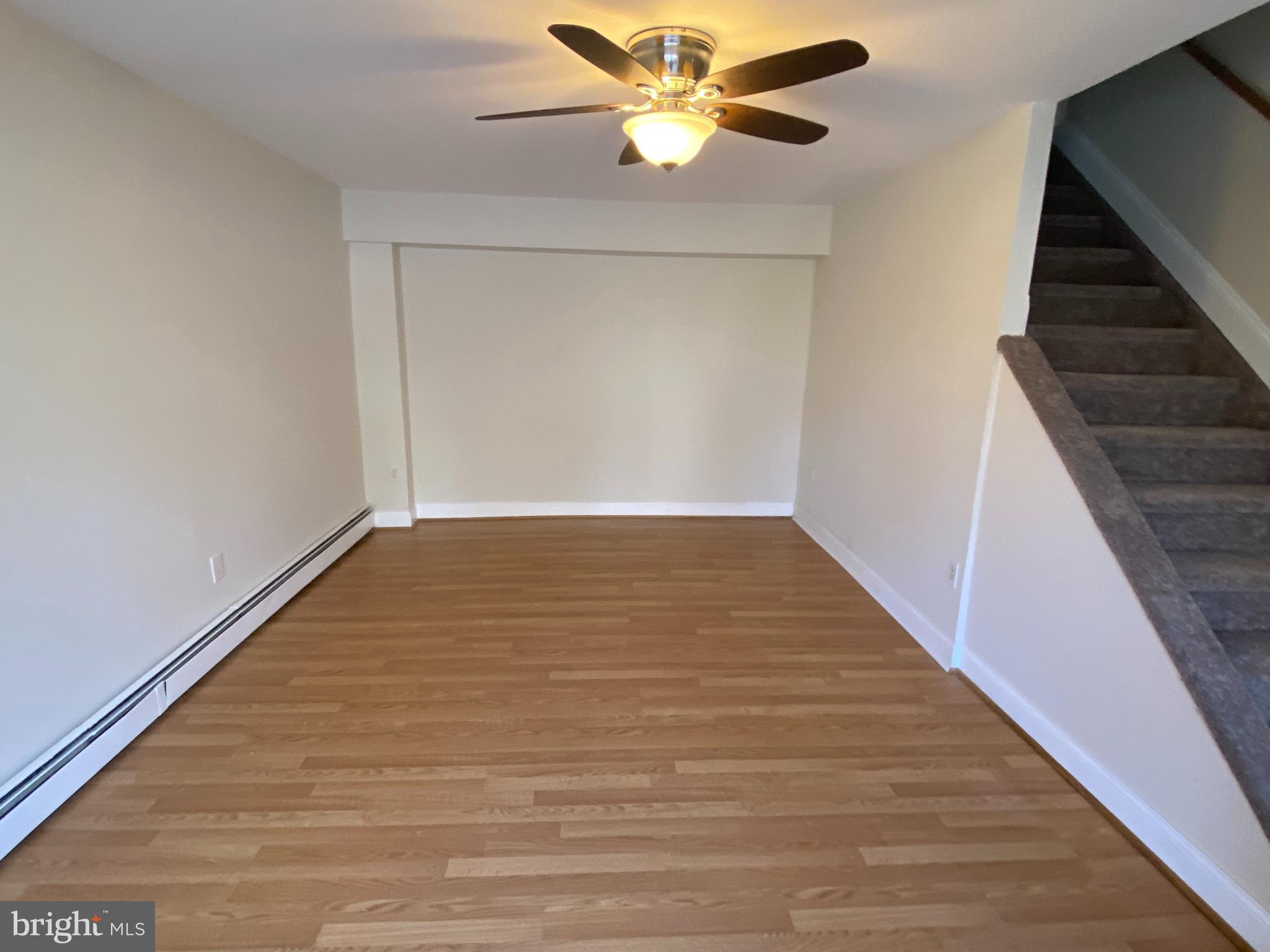 280 Bridgewater Road, Unit B18 Brookhaven, PA 19015 - Photo 7 of 23 Living room-laminate floor