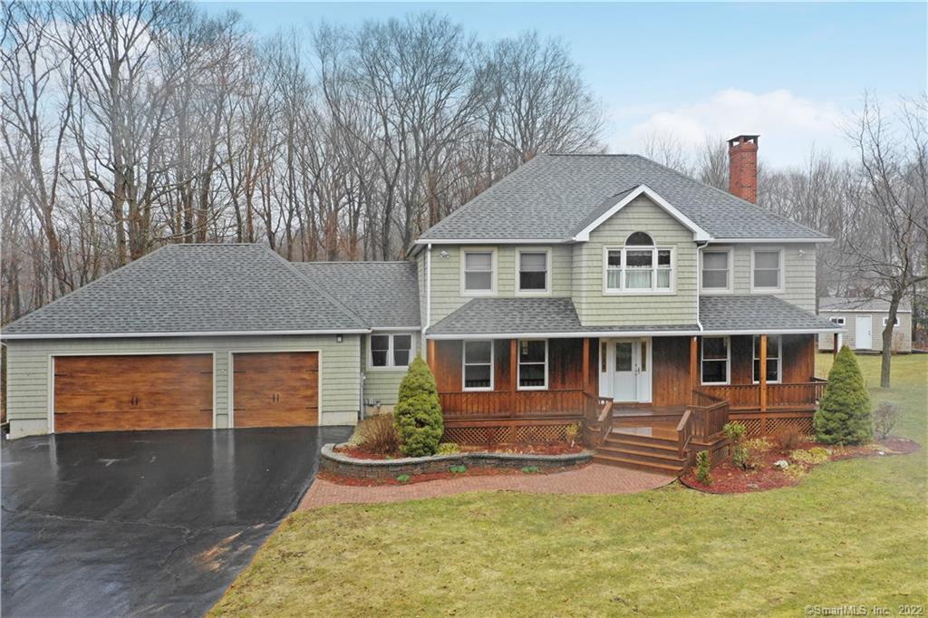 front view of a house with yard