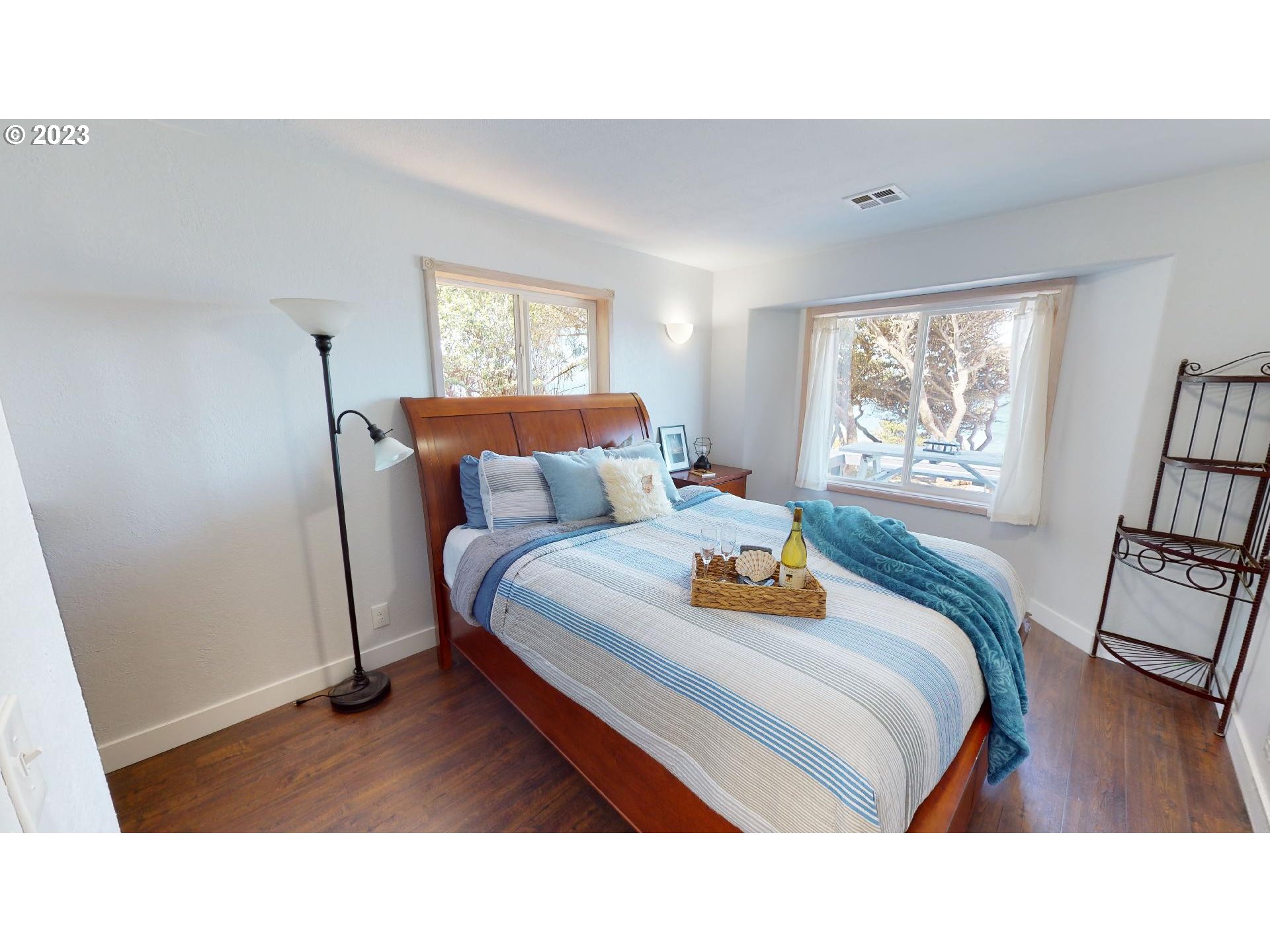 33704 Ophir Road Gold Beach, OR 97444 - Photo 32 of 47 a bedroom with furniture and a window
