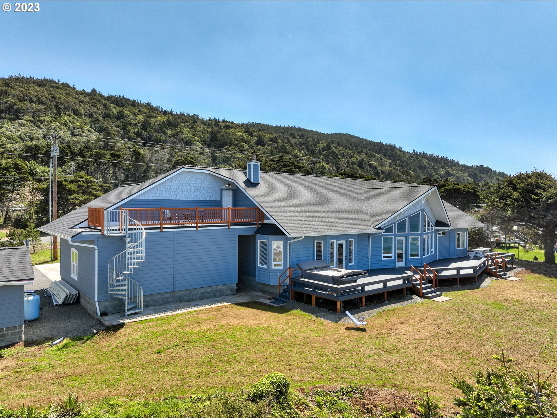33704 Ophir Road Gold Beach, OR 97444 - Photo 42 of 47 a aerial view of a house with a yard