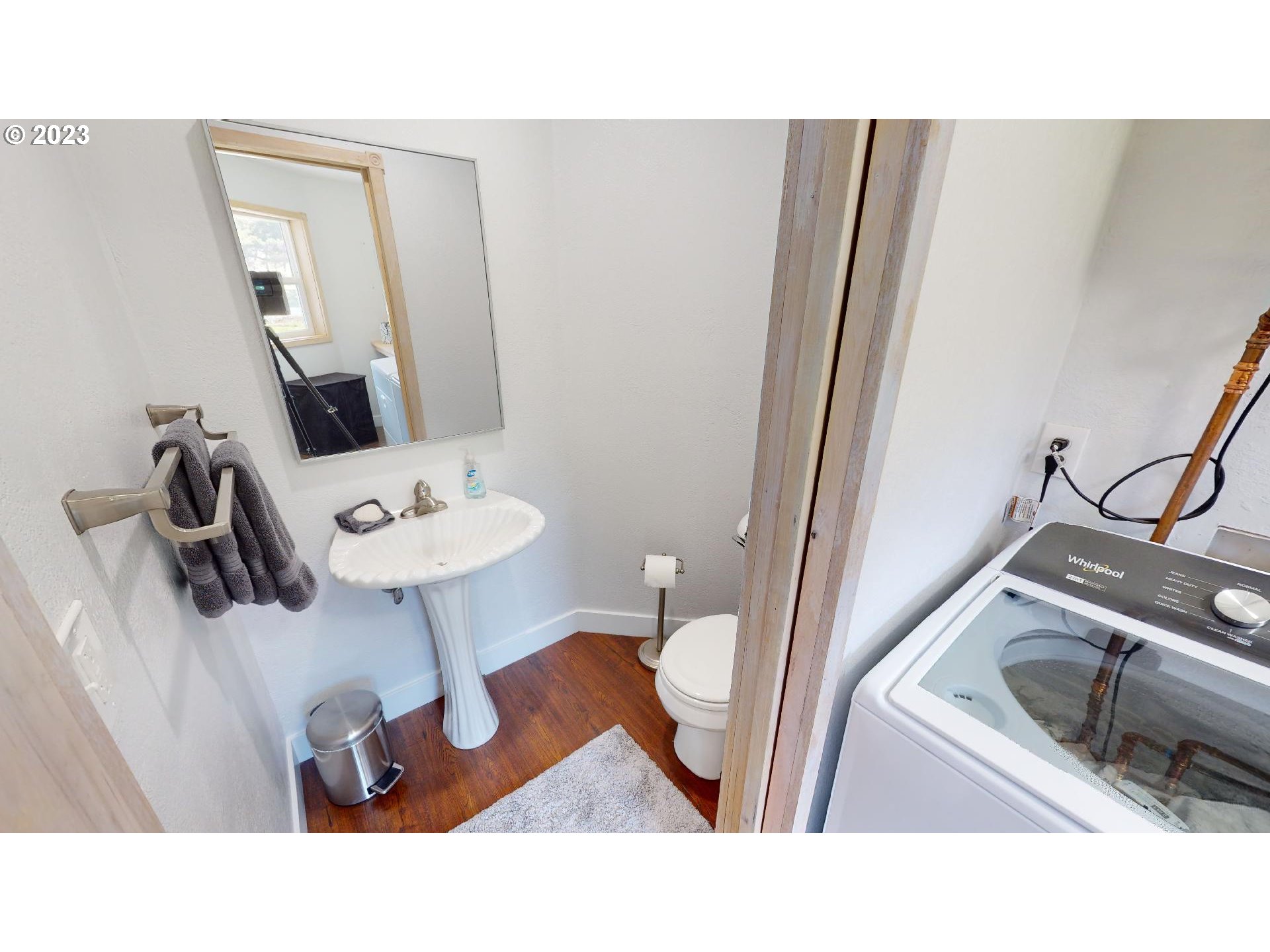 33704 Ophir Road Gold Beach, OR 97444 - Photo 44 of 47 a bathroom with a sink toilet and mirror