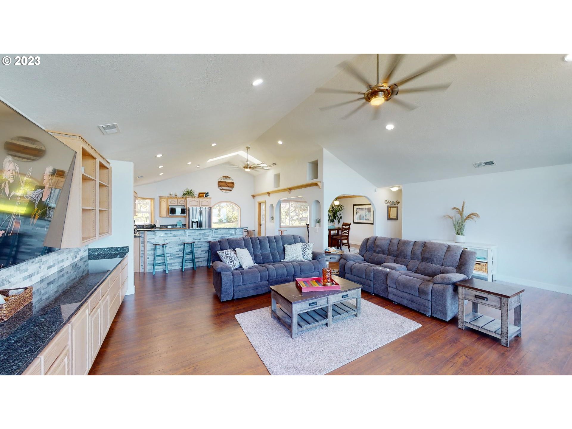 33704 Ophir Road Gold Beach, OR 97444 - Photo 8 of 47 a living room with furniture and a view of kitchen