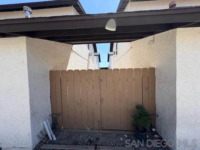 a view of a backyard with trees
