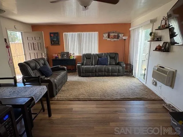 a kitchen with stainless steel appliances a refrigerator sink and cabinets