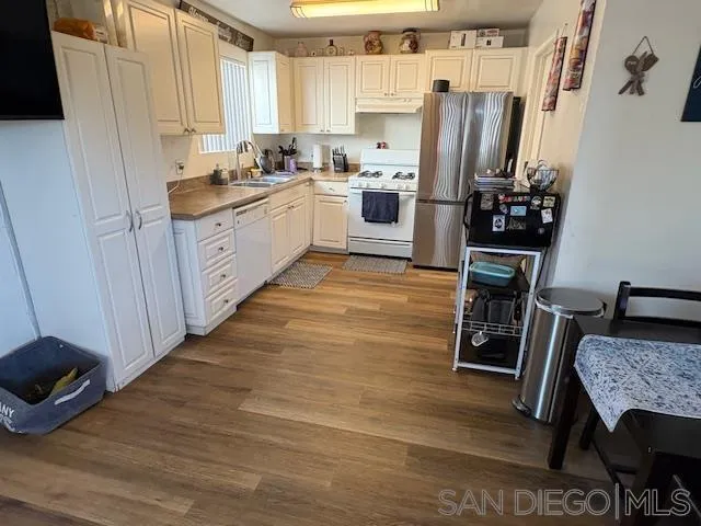 a bedroom with bed and window